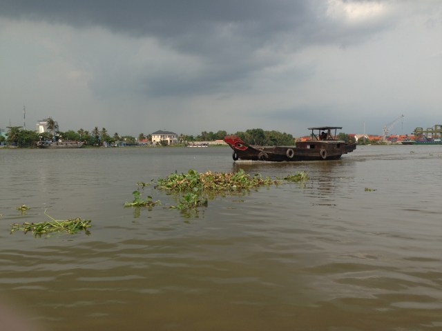 A lot of Vietnamese boats, like this one, have eyes on the bow to ward off evil spirits.  