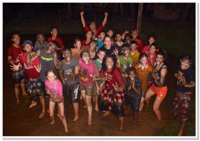 A group picture of the MZIS students (Ally is in the middle back, wearing a green T-shirt).  This picture was taken after they completed a course on Balinese Martial Arts.