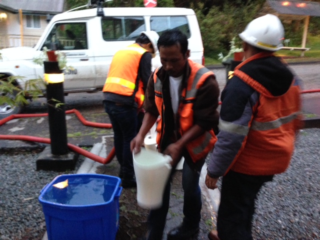 Town management employees filling our containers with water.