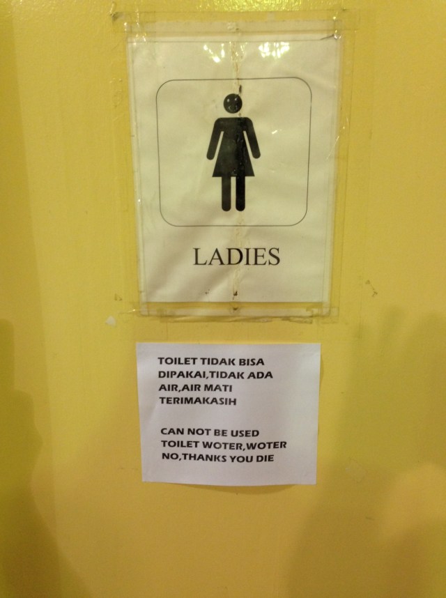 This sign was posted on the ladies' bathroom door when the water system was decimated during the landslide.  
