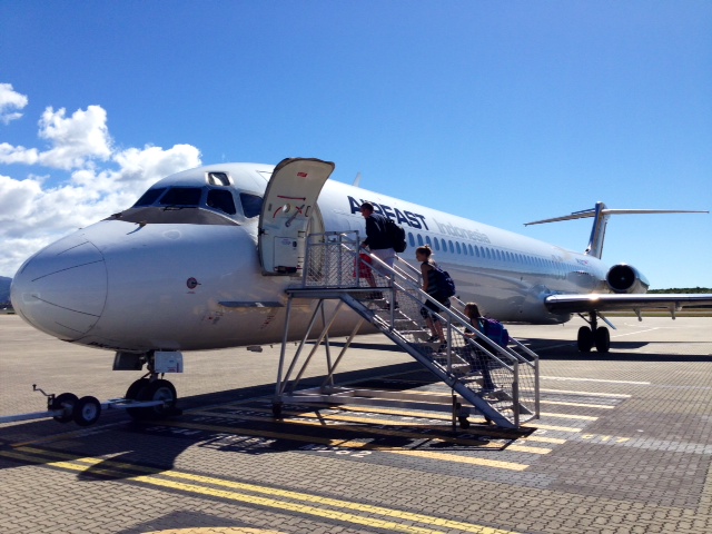 Boarding the airplane in Cairns, Australia, to return to Timika.  It looks like a typical boarding at this point.