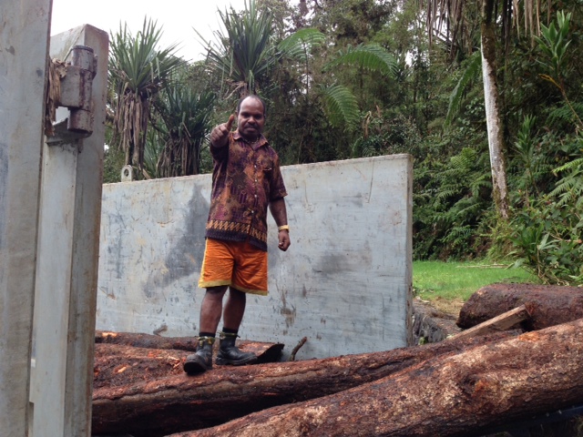 Loading it onto the cargo bed.  Photo - only English word they could say.