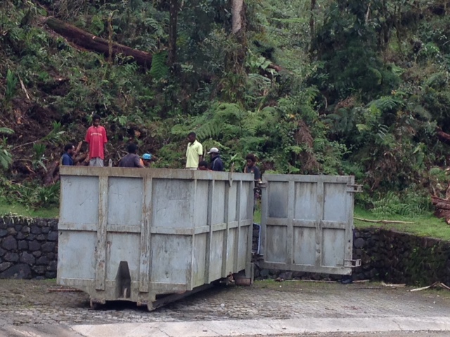 The company provided the container and a truck to transport the timber to the village.
