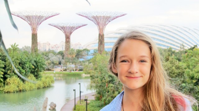 Ally standing in front of the gardens' Super Trees.