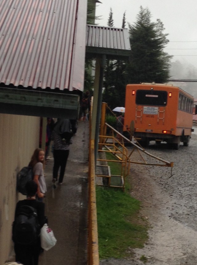 Ally heading toward the bus that is taking the students and teachers to the lowlands. They will stay in Timika tonight, and then fly to Cairns tomorrow morning. 